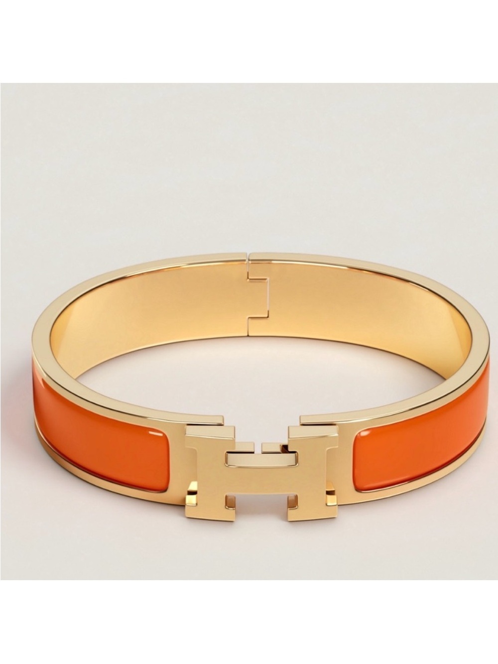 Hermes Orange and Gold Clic H Bracelet